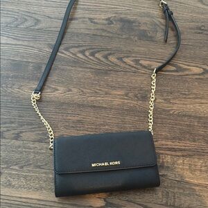 Michael Kors Black and Gold Crossbody Bag with Sleek Design